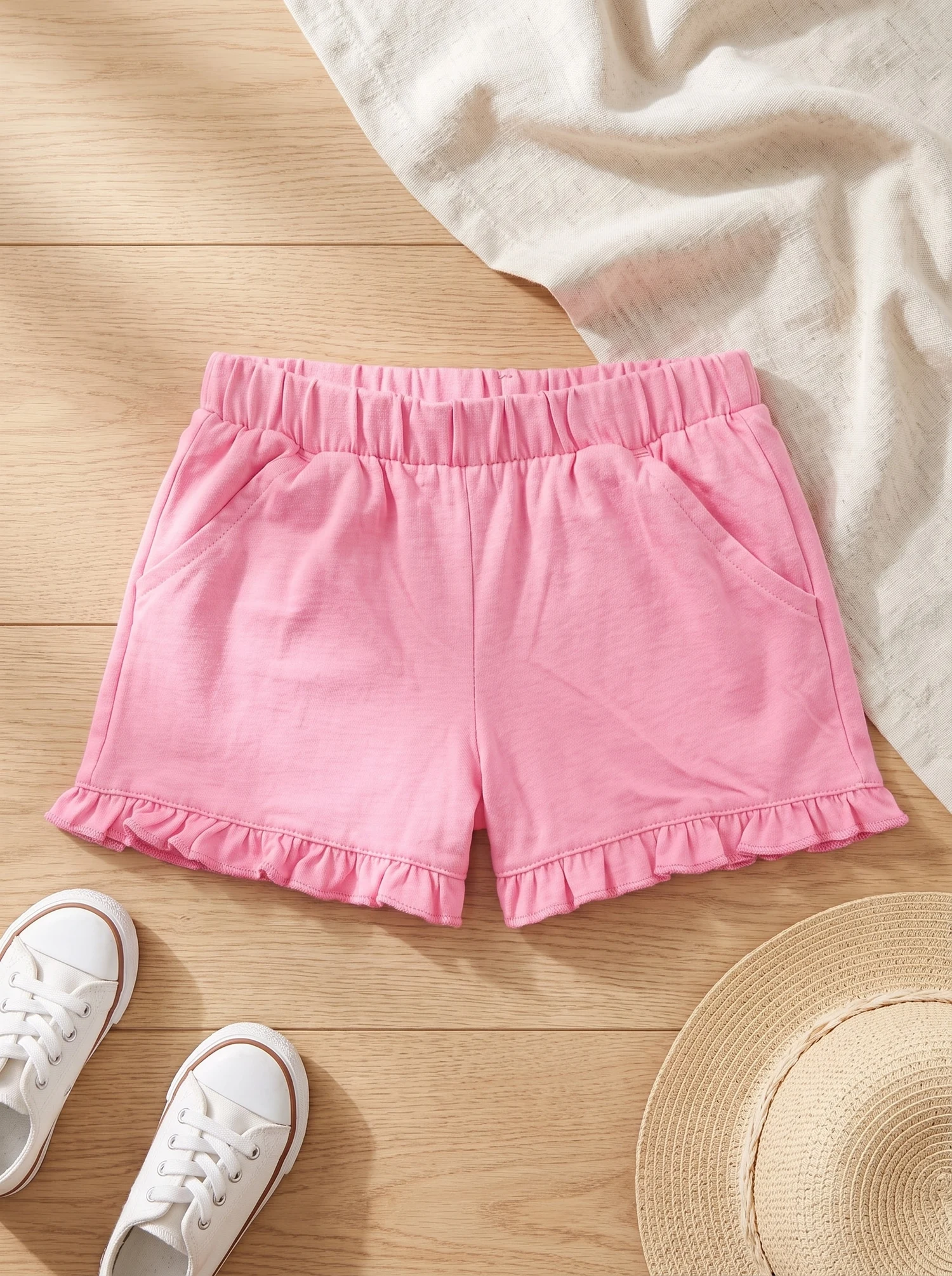Short rosado con volados